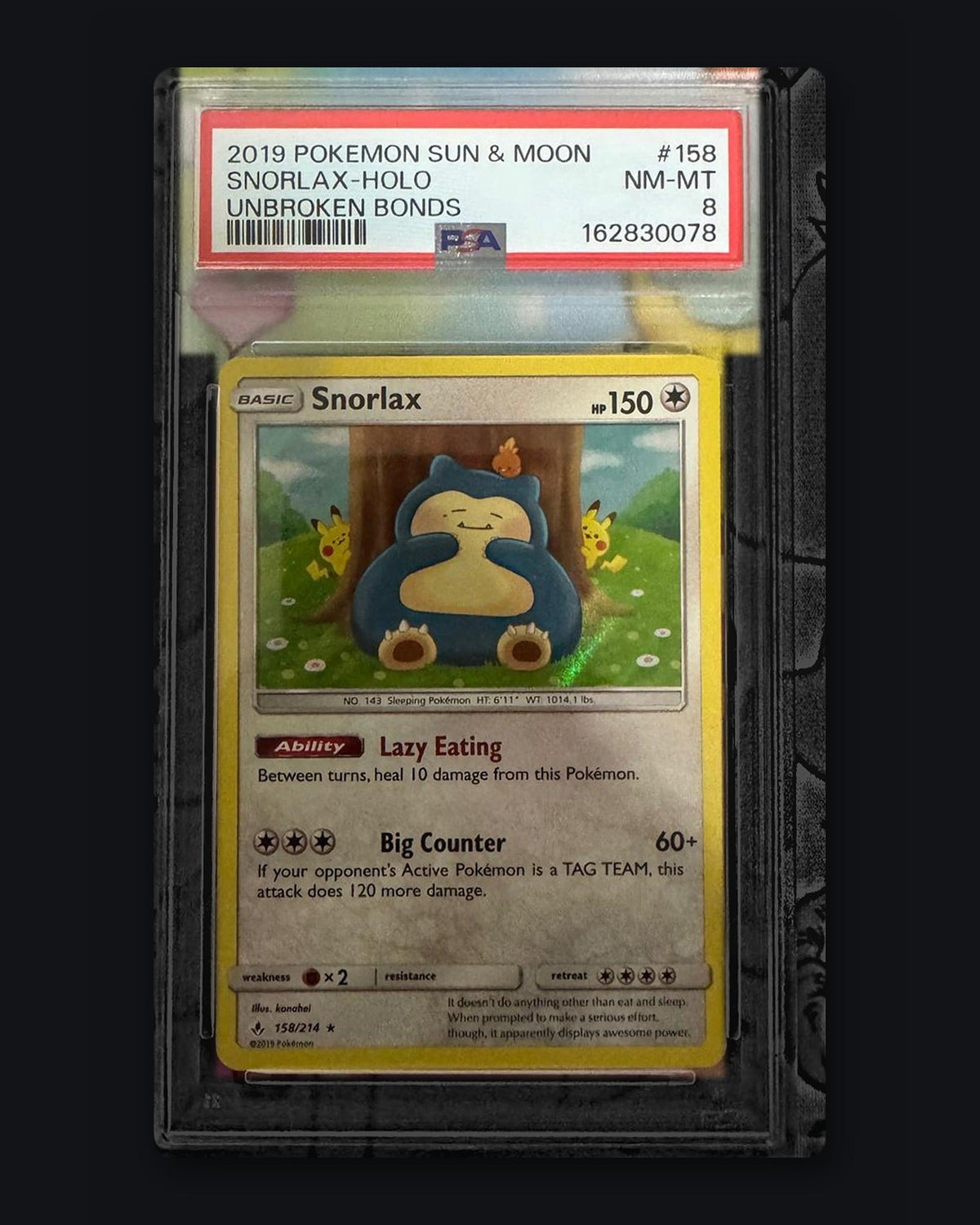PSA slab label on a Snorlax 158/214 from Unbroken Bonds, graded PSA 8